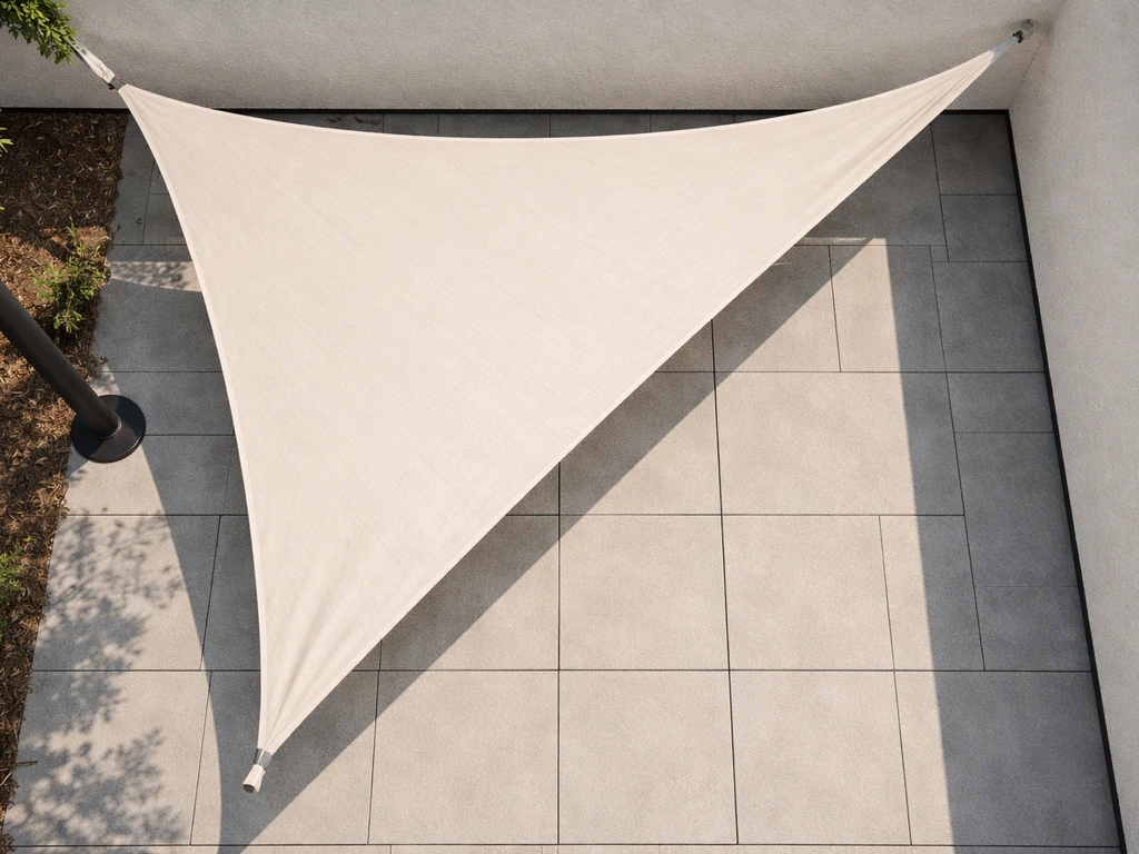 Overhead view of a patio with triangular shade sail layout and anchor points marked on fixed corners